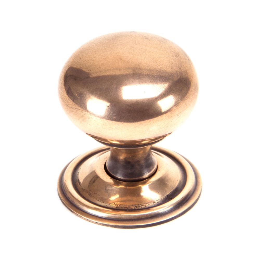 This is an image showing From The Anvil - Polished Bronze Mushroom Cabinet Knob 38mm available from T.H Wiggans Architectural Ironmongery in Kendal, quick delivery and discounted prices