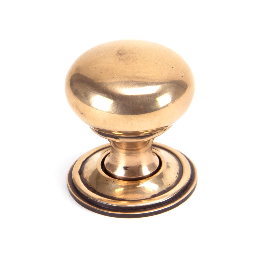 This is an image showing From The Anvil - Polished Bronze Mushroom Cabinet Knob 32mm available from T.H Wiggans Architectural Ironmongery in Kendal, quick delivery and discounted prices
