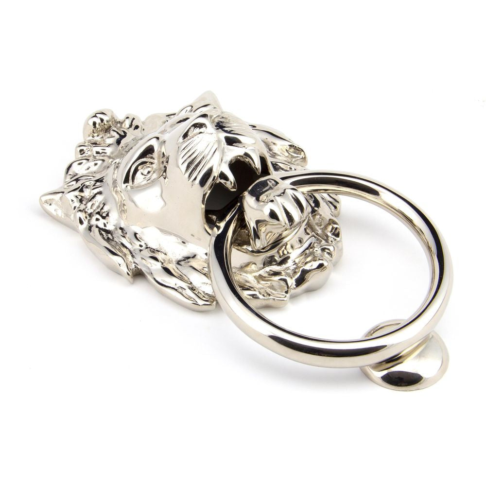 This is an image of From The Anvil - Polished Nickel Lion Head Door Knocker available to order from T.H Wiggans Architectural Ironmongery in Kendal, quick delivery and discounted prices.