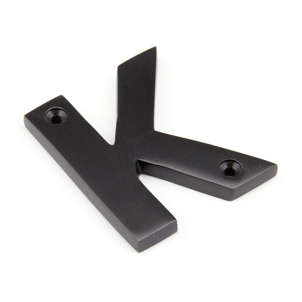 This is an image of From The Anvil - Aged Bronze Letter K available to order from T.H Wiggans Architectural Ironmongery in Kendal, quick delivery and discounted prices.