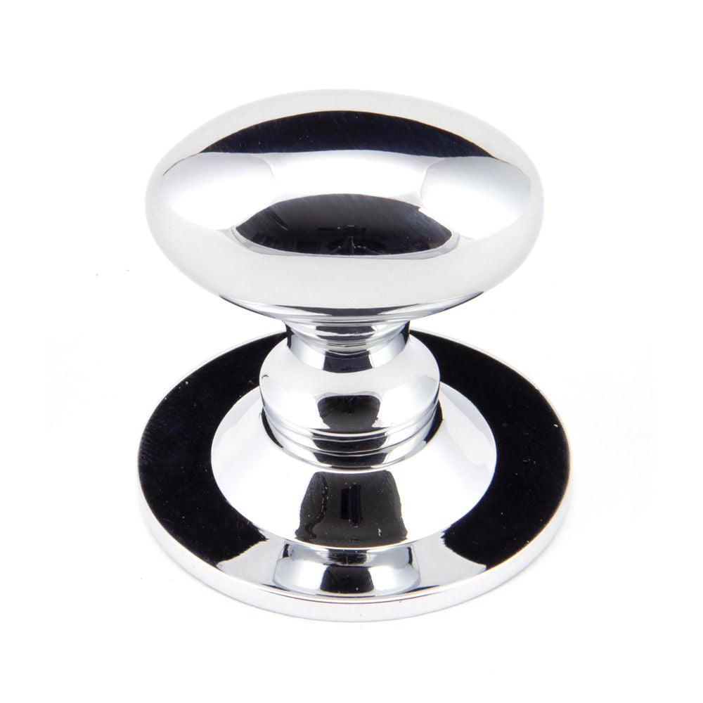 This is an image showing From The Anvil - Polished Chrome Oval Cabinet Knob 33mm available from T.H Wiggans Architectural Ironmongery in Kendal, quick delivery and discounted prices