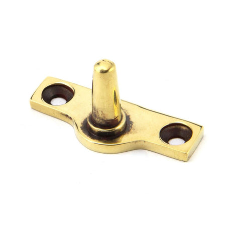 This is an image showing From The Anvil - Aged Brass Offset Stay Pin available from T.H Wiggans Architectural Ironmongery in Kendal, quick delivery and discounted prices