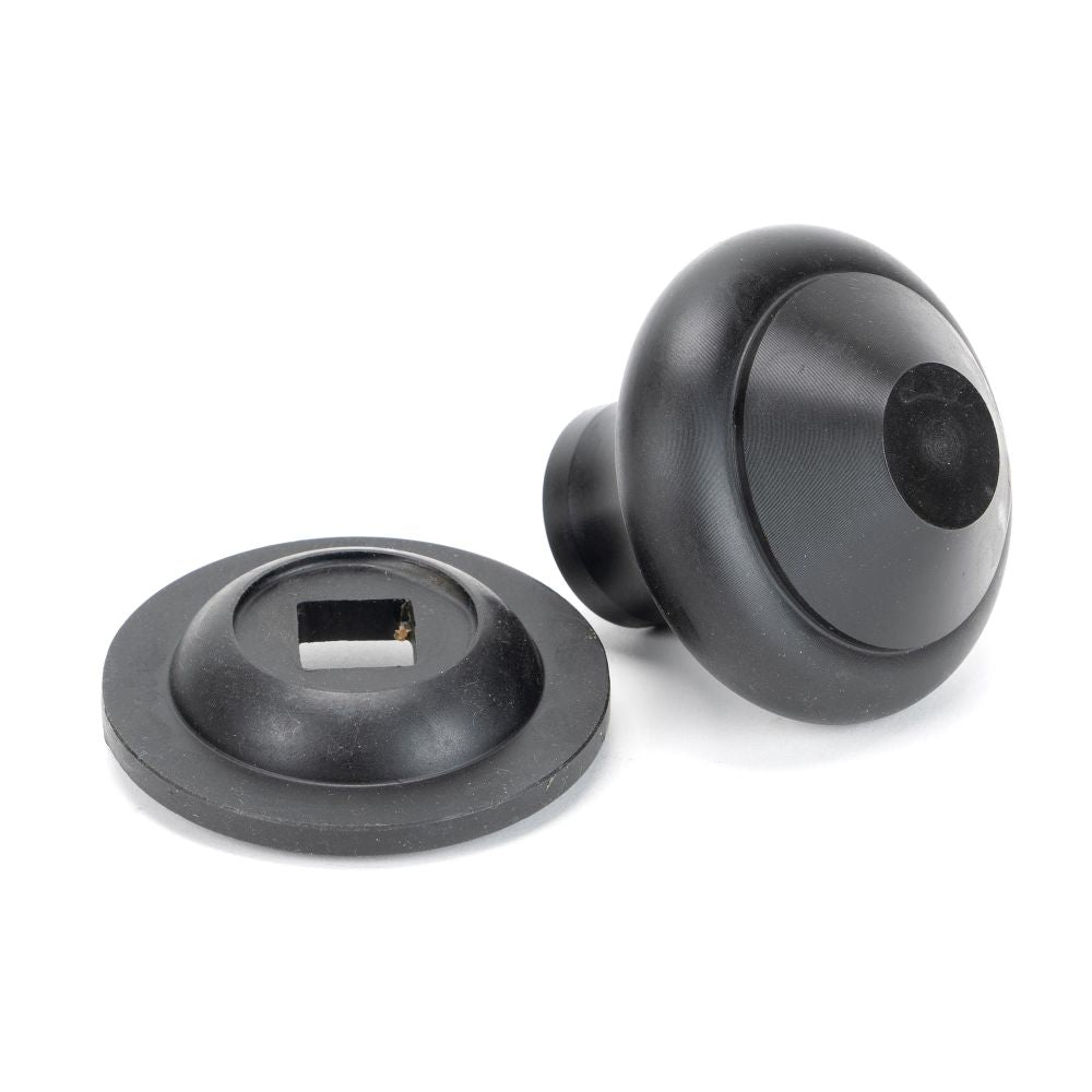 This is an image showing From The Anvil - External Beeswax Regency Centre Door Knob available from trade door handles, quick delivery and discounted prices