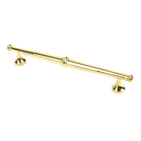 This is an image showing From The Anvil - Aged Brass Regency Pull Handle - Medium available from T.H Wiggans Architectural Ironmongery in Kendal, quick delivery and discounted prices