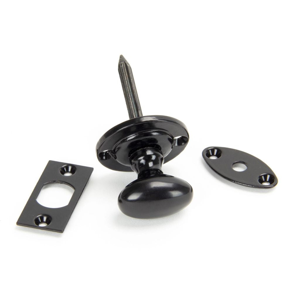 This is an image showing From The Anvil - Black Oval Rack Bolt available from T.H Wiggans Architectural Ironmongery in Kendal, quick delivery and discounted prices