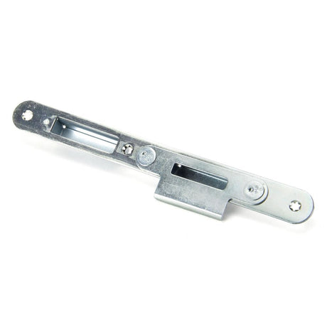 This is an image showing From The Anvil - BZP Winkhaus Centre Latch Keep LH 44mm Door available from T.H Wiggans Architectural Ironmongery in Kendal, quick delivery and discounted prices