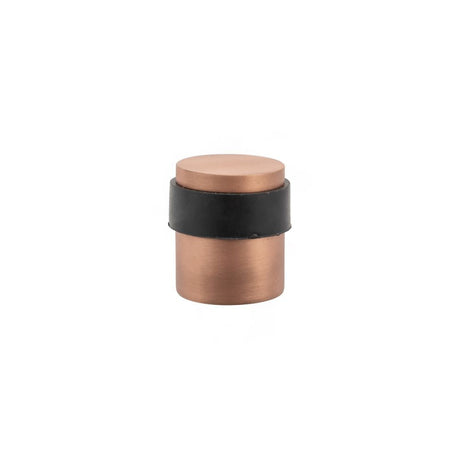 This is an image of Atlantic Cylinder Premium Floor Mounted Door Stop - Urban Satin Copper available to order from T.H Wiggans Architectural Ironmongery in Kendal, quick delivery and discounted prices.