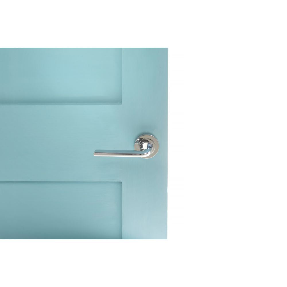 This is an image of Eco Surf Aluminium Lever on Round Rose - Polished Chrome available to order from Trade Door Handles.
