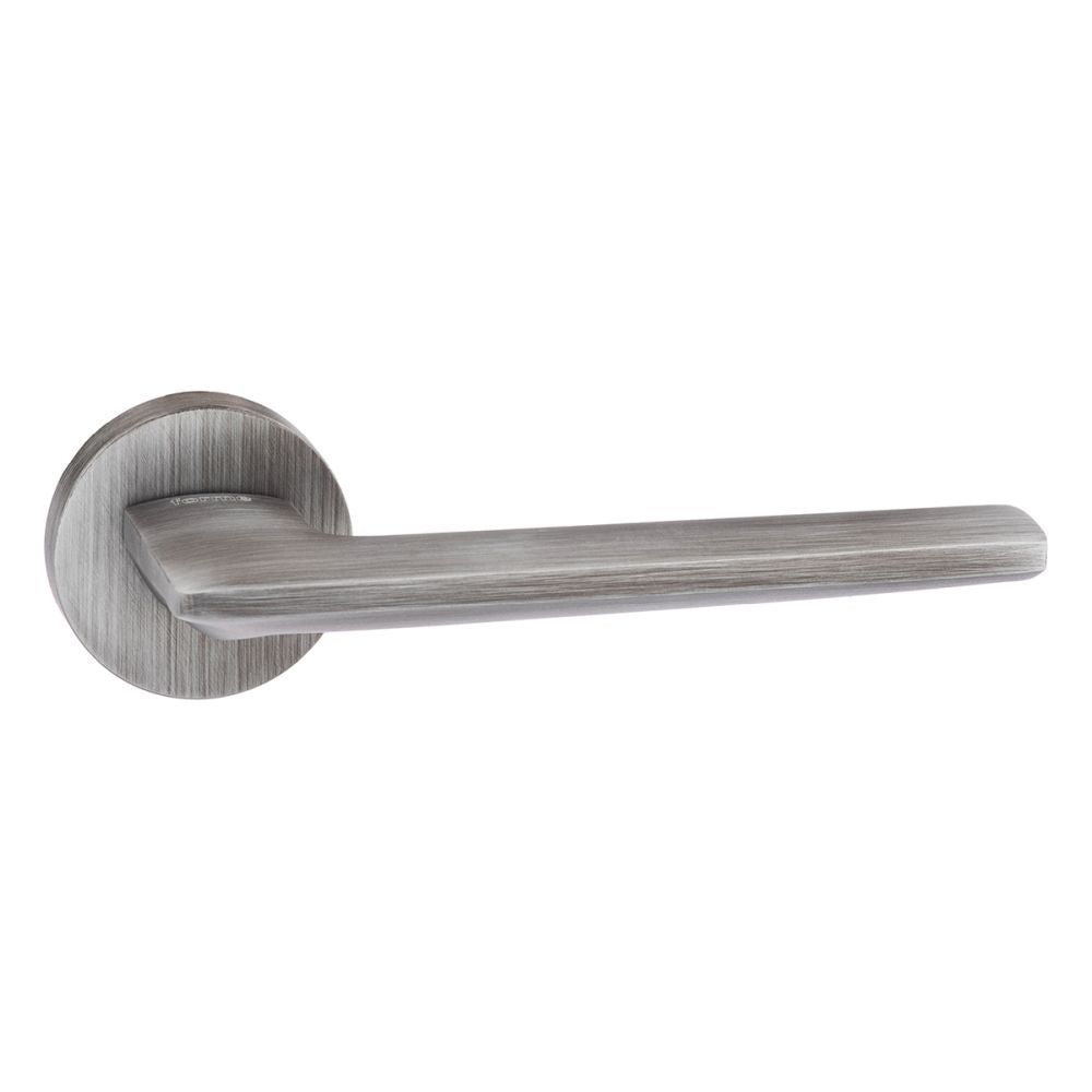 This is an image of Forme Boston Designer Lever on Minimal Round Rose - Urban Graphite available to order from T.H Wiggans Architectural Ironmongery in Kendal, quick delivery and discounted prices.