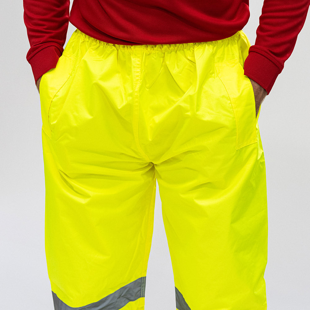 This is an image showing TIMCO Hi-Visibility Elasticated Waist Trousers - Yellow - Large - 1 Each Bag available from T.H Wiggans Ironmongery in Kendal, quick delivery at discounted prices.