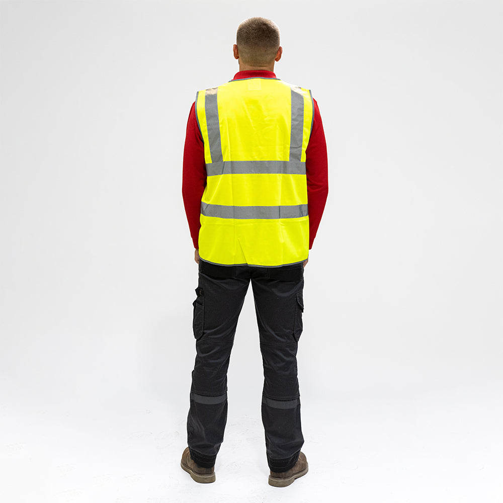 This is an image showing TIMCO Hi-Visibility Vest - Yellow - Large - 1 Each Bag available from T.H Wiggans Ironmongery in Kendal, quick delivery at discounted prices.