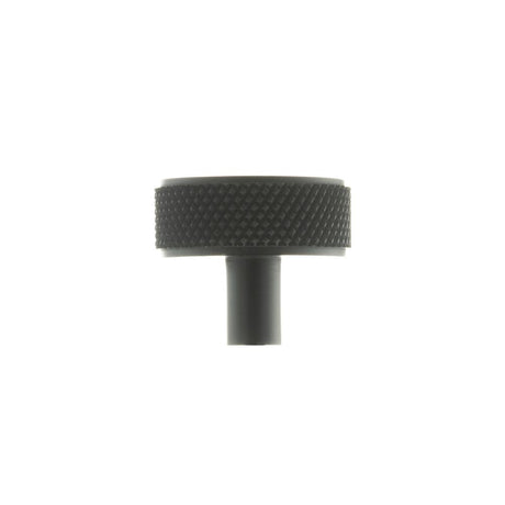This is an image of Millhouse Brass Hargreaves Disc Knurled Cabinet Knob Concealed Fix - Matt Black available to order from T.H Wiggans Architectural Ironmongery in Kendal.