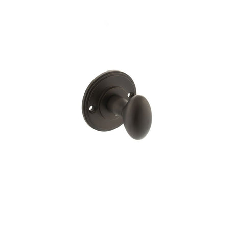 This is an image of Millhouse Brass Solid Brass Oval WC Turn and Release - Urban Dark Bronze available to order from T.H Wiggans Architectural Ironmongery in Kendal, quick delivery and discounted prices.