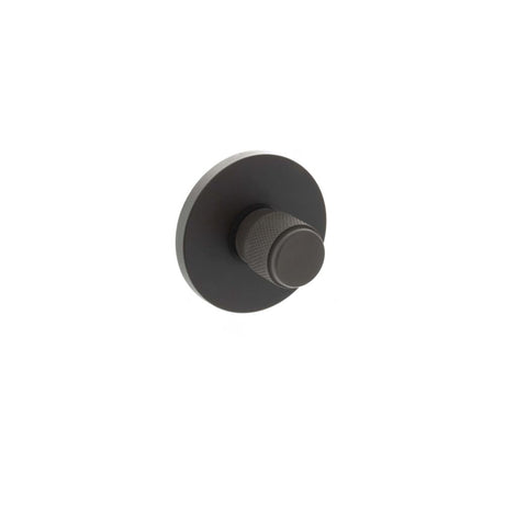 This is an image of Millhouse Brass Knurled WC Turn and Release on 5mm Slimline Round Rose - Urban D available to order from Trade Door Handles.