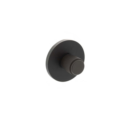 This is an image of Millhouse Brass Linear WC Turn and Release on 5mm Slimline Round Rose - Urban Da available to order from Trade Door Handles.