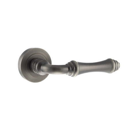 This is an image of Old English Durham Lever on Round Rose - Matt Gun Metal available to order from T.H Wiggans Architectural Ironmongery in Kendal, quick delivery and discounted prices.