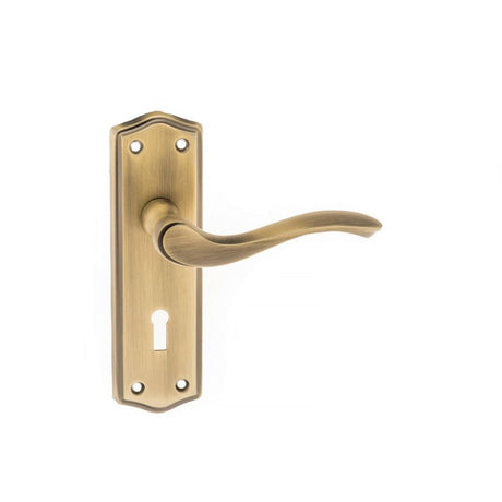 This is an image of Old English Warwick Key Lever on Backplate - Matt Antique Brass available to order from T.H Wiggans Architectural Ironmongery in Kendal, quick delivery and discounted prices.