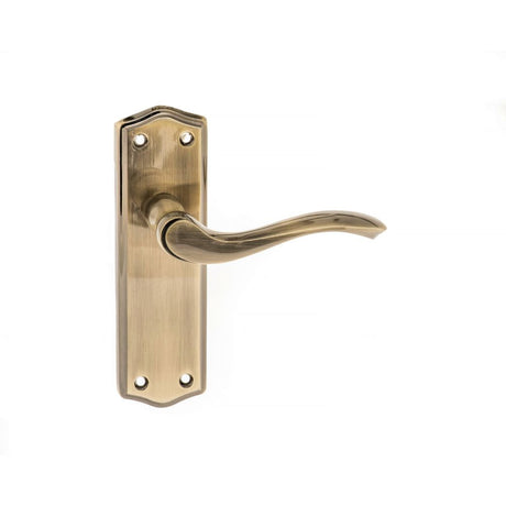 This is an image of Old English Warwick Latch Lever on Backplate - Antique Brass available to order from T.H Wiggans Architectural Ironmongery in Kendal, quick delivery and discounted prices.