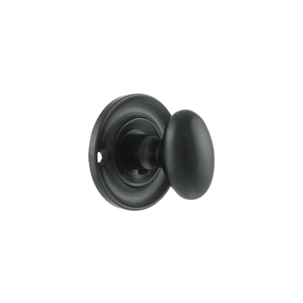 This is an image of Old English Solid Brass Oval WC Turn and Release - Matt Black available to order from T.H Wiggans Architectural Ironmongery in Kendal, quick delivery and discounted prices.