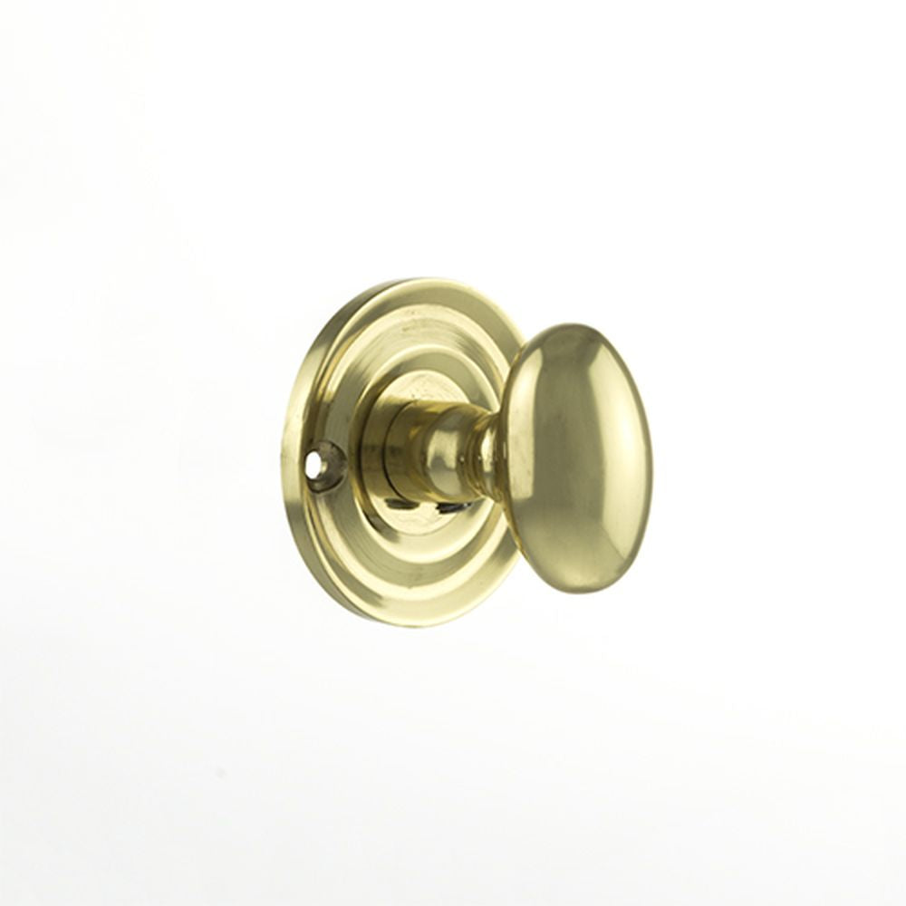 This is an image of Old English Solid Brass Oval WC Turn and Release - Polished Brass available to order from T.H Wiggans Architectural Ironmongery in Kendal, quick delivery and discounted prices.