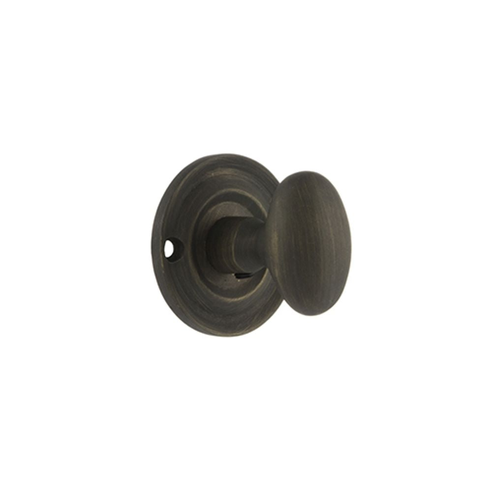 This is an image of Old English Solid Brass Oval WC Turn and Release - Urban Bronze available to order from T.H Wiggans Architectural Ironmongery in Kendal, quick delivery and discounted prices.