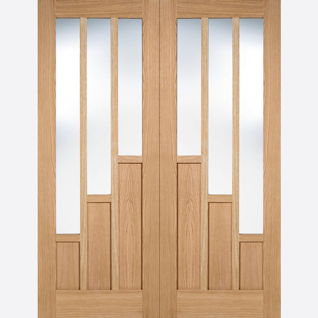 This is an image showing LPD - Coventry Pair Pre-Finished Oak Doors 1372 x 1981 available from T.H Wiggans Ironmongery in Kendal, quick delivery at discounted prices.