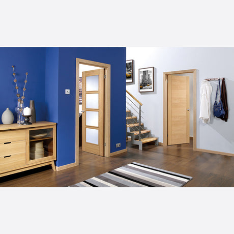 This is an image showing LPD - Vancouver 4L Pre-Finished Oak Doors 686 x 1981 FD 30 available from T.H Wiggans Ironmongery in Kendal, quick delivery at discounted prices.