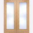 This is an image showing LPD - Vancouver Pair Pre-Finished Oak Doors 1168 x 1981 available from T.H Wiggans Ironmongery in Kendal, quick delivery at discounted prices.