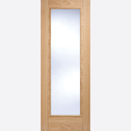 This is an image showing LPD - Vancouver Pattern 10 Pre-Finished Oak Doors 686 x 1981 FD 30 available from T.H Wiggans Ironmongery in Kendal, quick delivery at discounted prices.