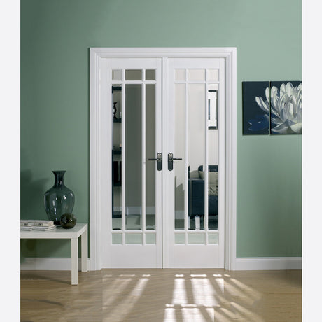 This is an image showing LPD - Manhattan W4 Primed White Doors 1246 x 2031 available from T.H Wiggans Ironmongery in Kendal, quick delivery at discounted prices.