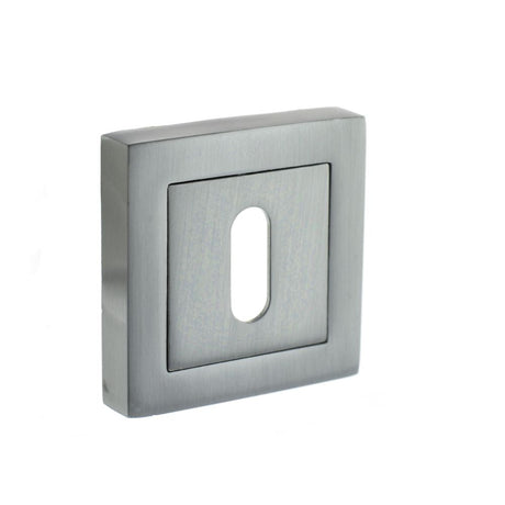 This is an image of STATUS Key Escutcheon on S4 Square Rose - Satin Chrome available to order from Trade Door Handles.