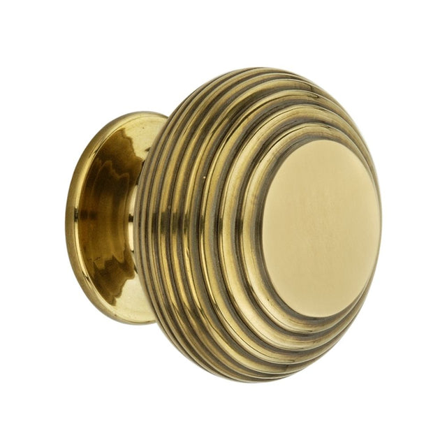 This is an image of Spira Brass - Beehive Large 40mm Cupboard Knob Aged Brass  available to order from T.H Wiggans Architectural Ironmongery in Kendal, quick delivery and discounted prices.