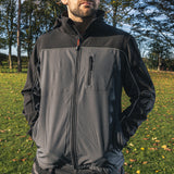 This is an image showing TIMCO Softshell Jacket - Grey/Black - Medium - 1 Each Bag available from T.H Wiggans Ironmongery in Kendal, quick delivery at discounted prices.