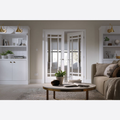 This is an image showing LPD - Manhattan 9L Pair Primed White Doors 1067 x 1981 available from T.H Wiggans Ironmongery in Kendal, quick delivery at discounted prices.