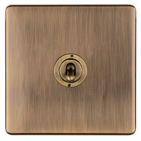 This is an image showing Eurolite 1 Gang 10Amp 2Way Toggle Switch- Antique Brassabt1sw available to order from T.H. Wiggans Ironmongery in Kendal, quick delivery and discounted prices.