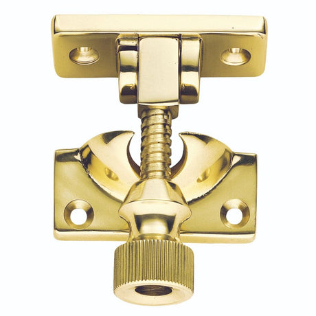 This is an image of a Carlisle Brass - Architectural Quality Brighton Sash Fastener - Polished Brass that is availble to order from T.H Wiggans Architectural Ironmongery in Kendal in Kendal.