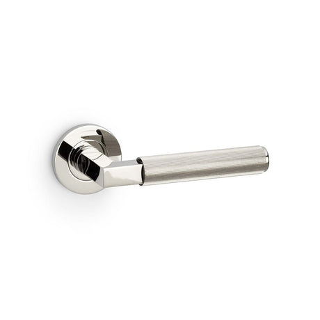 This is an image showing Alexander & Wilks Hurricane Reeded Lever on Round Rose - Polished Nickel PVD aw202pnpvd available to order from T.H Wiggans Ironmongery in Kendal, quick delivery and discounted prices.