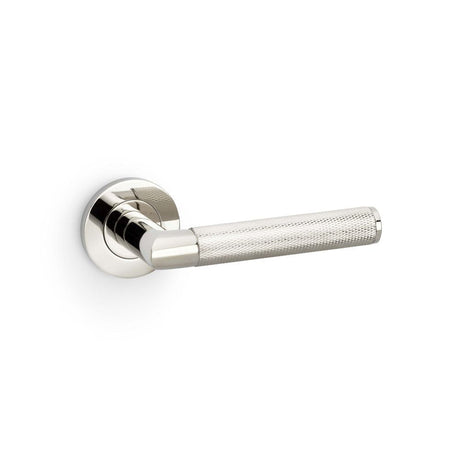 This is an image showing Alexander & Wilks Harrier Knurled Lever on Round Rose - Polished Nickel PVD aw210pnpvd available to order from T.H Wiggans Ironmongery in Kendal, quick delivery and discounted prices.