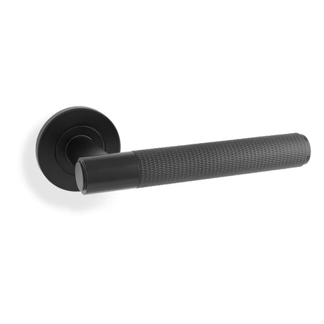 This is an image showing Alexander & Wilks Spitfire Knurled Lever on Round Rose - Black aw220bl available to order from T.H Wiggans Ironmongery in Kendal, quick delivery and discounted prices.