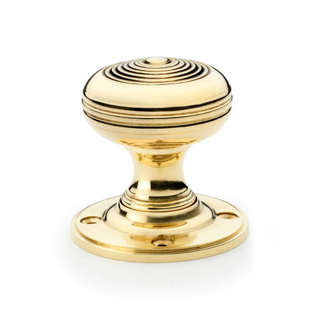 This is an image showing Alexander & Wilks Christoph Mortice Knob - Unlacquered Brass aw303-50-ub available to order from T.H Wiggans Ironmongery in Kendal, quick delivery and discounted prices.