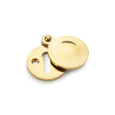 This is an image showing Alexander & Wilks Standard Key Profile Round Escutcheon with Harris Design Cover - Unlacquered Brass aw381-ub available to order from T.H Wiggans Ironmongery in Kendal, quick delivery and discounted prices.