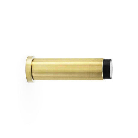 This is an image showing Alexander & Wilks Reeded Projection Door Stop - Satin Brass PVD aw602-75-sbpvd available to order from T.H Wiggans Ironmongery in Kendal, quick delivery and discounted prices.