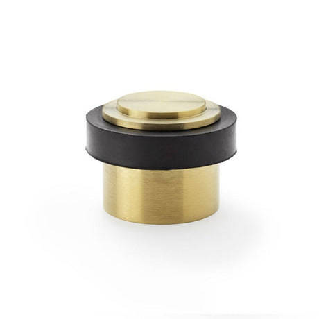 This is an image showing Alexander & Wilks Plain Floor Mounted Door Stop - Satin Brass PVD aw603sbpvd available to order from T.H Wiggans Ironmongery in Kendal, quick delivery and discounted prices.