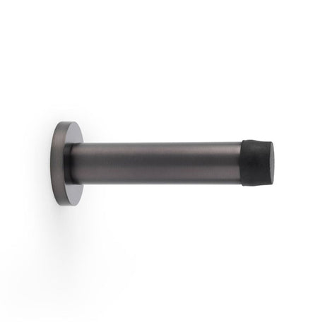 This is an image showing Alexander & Wilks Cylinder Projection Door Stop on Rose - Dark Bronze aw616dbz available to order from T.H Wiggans Ironmongery in Kendal, quick delivery and discounted prices.