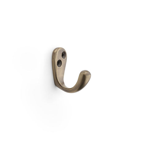 This is an image showing Alexander & Wilks Victorian Single Robe Hook - Antique Brass aw774ab available to order from T.H Wiggans Ironmongery in Kendal, quick delivery and discounted prices.