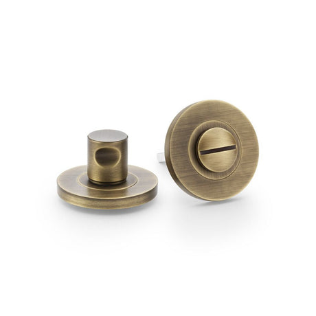 This is an image showing Alexander & Wilks Plain Thumbturn and Release - Antique Brass aw791ab available to order from T.H Wiggans Ironmongery in Kendal, quick delivery and discounted prices.