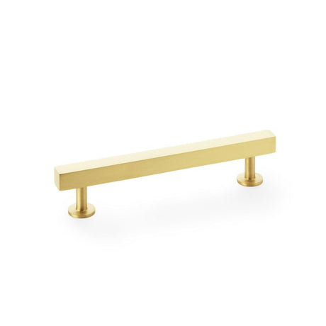 This is an image showing Alexander & Wilks Square T-Bar Cabinet Pull Handle - Satin Brass - Centres 128mm aw815-128-sb available to order from T.H Wiggans Ironmongery in Kendal, quick delivery and discounted prices.