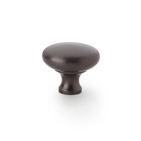 This is an image showing Alexander & Wilks Wade Round Cupboard Knob - Dark Bronze - 38mm aw836-38-dbz available to order from T.H Wiggans Ironmongery in Kendal, quick delivery and discounted prices.