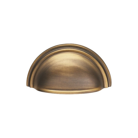 This is an image of a FTD - Victorian Cup Pull - Antique Brass that is availble to order from T.H Wiggans Architectural Ironmongery in Kendal in Kendal.