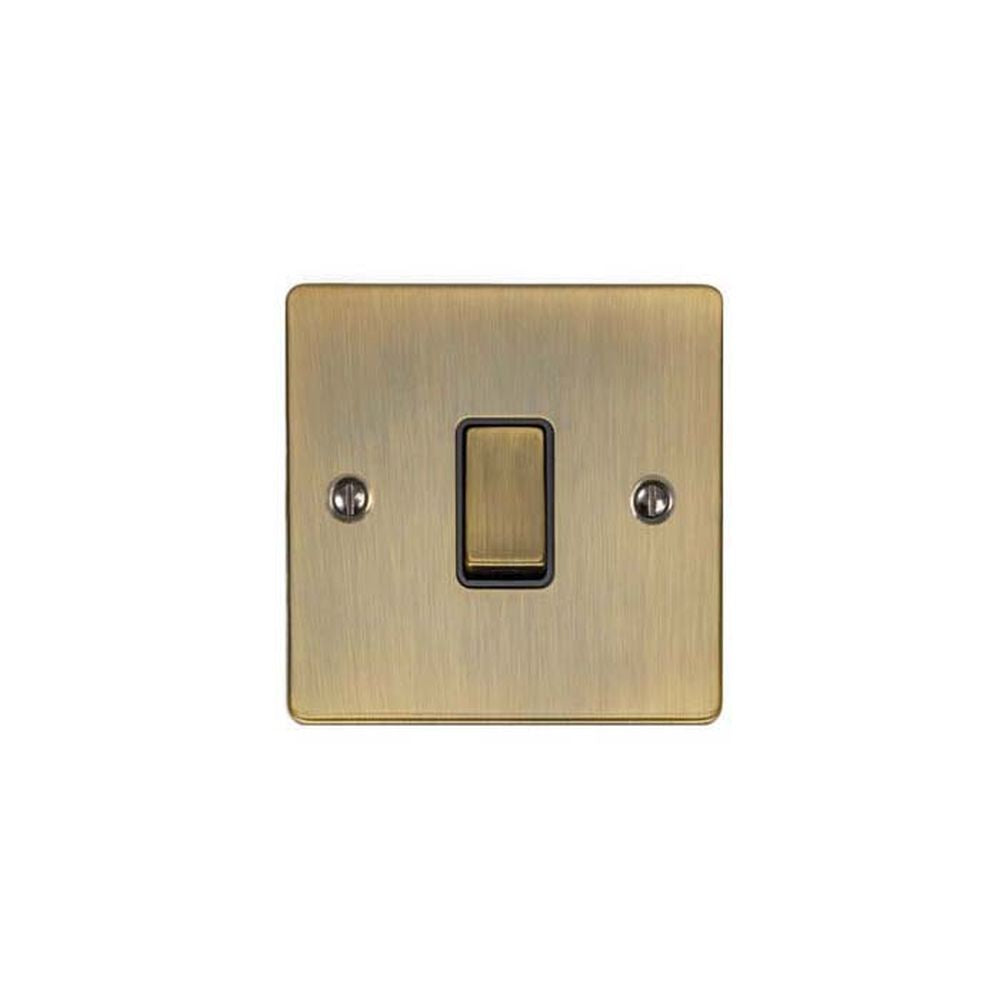 This is an image showing Eurolite Enhance Decorative 20Amp Switch - Antique Brass (With Black Trim) en20adpswabb available to order from T.H. Wiggans Ironmongery in Kendal, quick delivery and discounted prices.